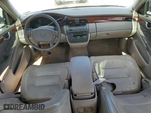 ✅ 2002 Cadillac DeVille • VIN: 1G6KD54Y82U202531 • Lot: 77361814. Wystawiony na Copart z przebiegiem 98 343 mil. Bezpłatny archiwum sprzedaży aukcyjnych z USA i szczegółowy raport historii pojazdu na DreamBid. Zdjęcie 8.