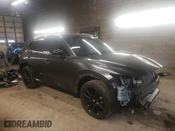 ✅ 2022 Mazda CX-5 2.5 Turbo • VIN: JM3KFBAY0N0575981 • Lot: 43878863. Wystawiony na Copart z przebiegiem 20 941 mil. Bezpłatny archiwum sprzedaży aukcyjnych z USA i szczegółowy raport historii pojazdu na DreamBid. Zdjęcie 4.