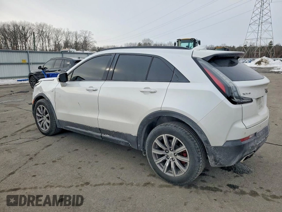 ✅ 2021 Cadillac XT4 FWD Sport • VIN: 1GYFZER46MF053219 • Lot: 76289145. Wystawiony na Copart z przebiegiem 99 885 mil. Bezpłatny archiwum sprzedaży aukcyjnych z USA i szczegółowy raport historii pojazdu na DreamBid. Zdjęcie 2.