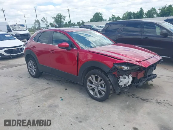 ✅ 2020 Mazda CX-30 Select • VIN: 3MVDMBCL3LM132824 • Lot: 45011848. Listed on IAAI with 32,766 mi. Free auction sales archive from the USA and detailed vehicle history report at DreamBid. Image 1.