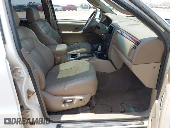 ✅ 2004 Jeep Grand Cherokee Limited • VIN: 1J4GW58NX4C305126 • Lot: 45197853. Wystawiony na IAAI z przebiegiem 158 733 mil. Bezpłatny archiwum sprzedaży aukcyjnych z USA i szczegółowy raport historii pojazdu na DreamBid. Zdjęcie 5.