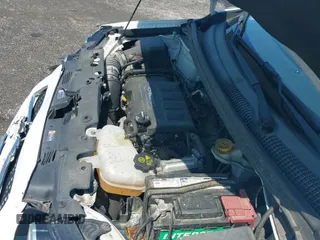 2015 Chevrolet Sonic RS z VIN 1G1JG5SB4F4177978, wystawiony jako IAAI lot #42811254 z przebiegiem 112 779 mil mil oraz . Historia ofert i sprzedaży dostępna na DreamBid. Obrazek 19.