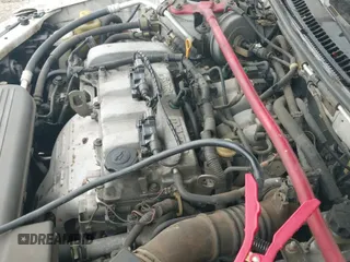 ✅ 2002 Mazda Protege • VIN: JM1BJ245321610379 • Lot: 43153894. Listed on IAAI with 136,808 mi. Free auction sales archive from the USA and detailed vehicle history report at DreamBid. Image 12.