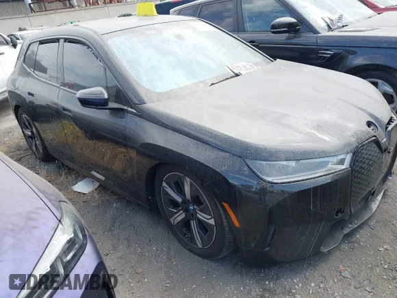 ✅ 2023 BMW iX xDrive50 • VIN: WB523CF06PCM54850 • Lot: 45128894. Listed on IAAI with 94,469 mi. Free auction sales archive from the USA and detailed vehicle history report at DreamBid. Image 1.