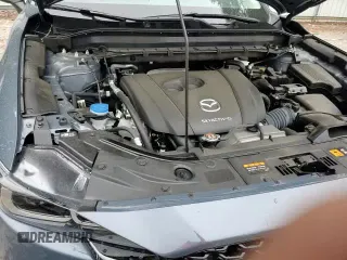 ✅ 2024 Mazda CX-5 S Carbon Edition • VIN: JM3KFBCL8R0448256 • Лот: 85311155. Опубликован ранее на Copart с пробегом 14 069 миль. Бесплатный доступ к архиву аукционных продаж из США и подробный отчёт об истории автомобиля на DreamBid. Изображение 13.