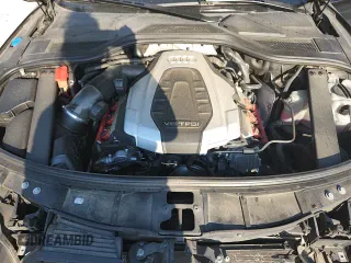 ✅ 2017 Audi A8 • VIN: WAU44AFDXHN007605 • Лот: 71216535. Опубликован ранее на Copart с пробегом 92 019 миль. Бесплатный доступ к архиву аукционных продаж из США и подробный отчёт об истории автомобиля на DreamBid. Изображение 13.