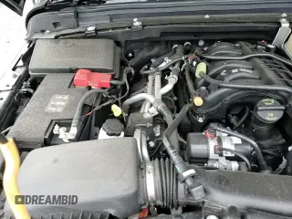 ✅ 2023 Jeep Wrangler Sport • VIN: 1C4HJXDG4PW639232 • Lot: 71129035. Wystawiony na Copart z przebiegiem 44 074 mil. Bezpłatny archiwum sprzedaży aukcyjnych z USA i szczegółowy raport historii pojazdu na DreamBid. Zdjęcie 13.