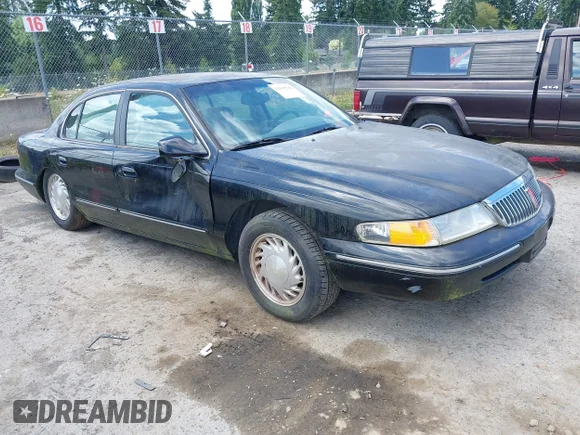✅ 1997 Lincoln Continental • VIN: 1LNLM97V3VY688491 • Lot: 42658288. Wystawiony na IAAI z przebiegiem 115 753 mil. Bezpłatny archiwum sprzedaży aukcyjnych z USA i szczegółowy raport historii pojazdu na DreamBid. Zdjęcie 1.