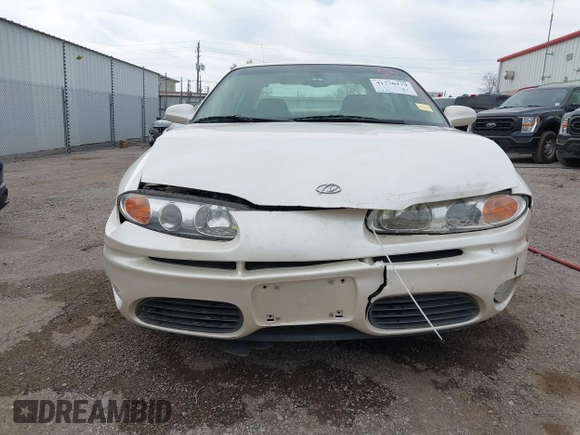 ✅ 2002 Oldsmobile Aurora • VIN: 1G3GS64C124127044 • Лот: 41770179. Опубліковано раніше на IAAI з пробігом 119 841 миль. Безкоштовний доступ до архіву аукціонних продажів зі США та докладний звіт про історію автомобіля на DreamBid. Зображення 6.