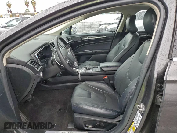 ✅ 2019 Ford Fusion Titanium • VIN: 3FA6P0SU6KR177358 • Лот: 97980215. Опубликован ранее на Copart с пробегом 107 126 миль. Бесплатный доступ к архиву аукционных продаж из США и подробный отчёт об истории автомобиля на DreamBid. Изображение 7.