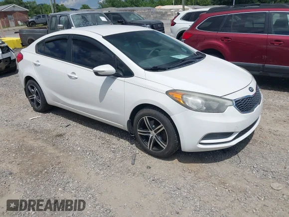 ✅ 2014 Kia Forte LX • VIN: KNAFX4A64E5238327 • Лот: 45399828. Опубліковано раніше на IAAI з пробігом 99 774 миль. Безкоштовний доступ до архіву аукціонних продажів зі США та докладний звіт про історію автомобіля на DreamBid. Зображення 1.