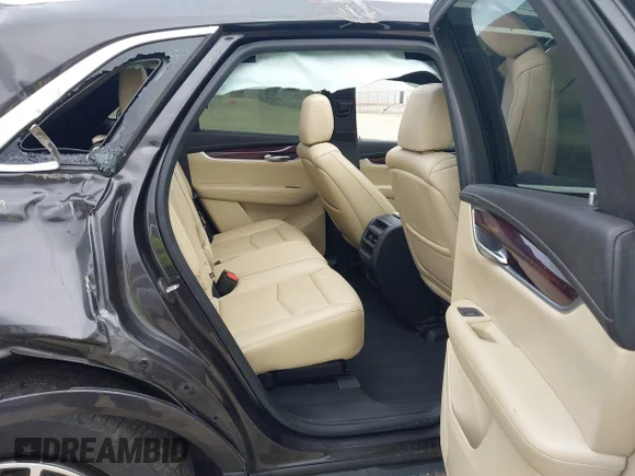✅ 2018 Cadillac XT5 Luxury FWD • VIN: 1GYKNCRSXJZ171958 • Лот: 43416372. Опубликован ранее на IAAI с пробегом 50 078 миль. Бесплатный доступ к архиву аукционных продаж из США и подробный отчёт об истории автомобиля на DreamBid. Изображение 8.
