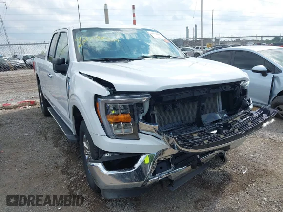 ✅ 2023 Ford F-150 XL • VIN: 1FTFX1E58PKE84871 • Lot: 42777004. Wystawiony na IAAI z przebiegiem 15 311 mil. Bezpłatny archiwum sprzedaży aukcyjnych z USA i szczegółowy raport historii pojazdu na DreamBid. Zdjęcie 6.