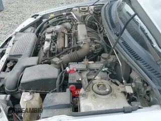 ✅ 2000 Mazda Protege DX • VIN: JM1BJ2225Y0211691 • Lot: 42464257. Listed on IAAI with 176,457 mi. Free auction sales archive from the USA and detailed vehicle history report at DreamBid. Image 12.