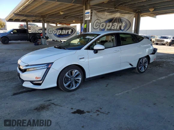 ✅ 2018 Honda Clarity • VIN: JHMZC5F14JC009195 • Lot: 57422066. Wystawiony na Copart z przebiegiem 96 178 mil. Bezpłatny archiwum sprzedaży aukcyjnych z USA i szczegółowy raport historii pojazdu na DreamBid. Zdjęcie 1.