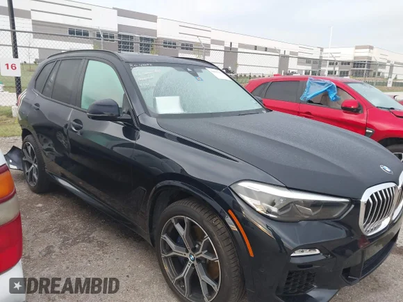 ✅ 2021 BMW X5 sDrive40i • VIN: 5UXCR4C09M9H29915 • Lot: 44891661. Listed on IAAI with 53,981 mi. Free auction sales archive from the USA and detailed vehicle history report at DreamBid. Image 1.