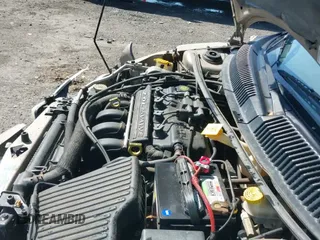 2000 Dodge Neon Highline z VIN 1B3ES46C7YD764572, wystawiony jako IAAI lot #41787703 z przebiegiem 204 657 mil mil oraz . Historia ofert i sprzedaży dostępna na DreamBid. Obrazek 19.