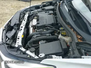 ✅ 2018 Chevrolet Cruze LS • VIN: 1G1BC5SM5J7214433 • Lot: 42616404. Listed on IAAI with 171,129 mi. Free auction sales archive from the USA and detailed vehicle history report at DreamBid. Image 19.