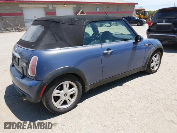✅ 2005 MINI Convertible • VIN: WMWRF33575TF63633 • Lot: 45334474. Listed on IAAI with 129,594 mi. Free auction sales archive from the USA and detailed vehicle history report at DreamBid. Image 4.
