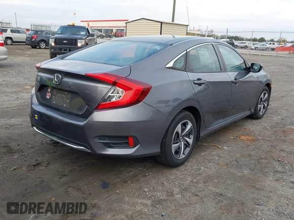 ✅ 2019 Honda Civic LX • VIN: 19XFC2F67KE000418 • Lot: 44240597. Wystawiony na IAAI z przebiegiem 71 301 mil. Bezpłatny archiwum sprzedaży aukcyjnych z USA i szczegółowy raport historii pojazdu na DreamBid. Zdjęcie 4.