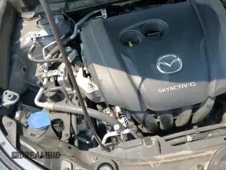 ✅ 2020 Mazda CX-30 Premium • VIN: 3MVDMAEM7LM109286 • Lot: 64549005. Wystawiony na Copart z przebiegiem 60 479 mil. Bezpłatny archiwum sprzedaży aukcyjnych z USA i szczegółowy raport historii pojazdu na DreamBid. Zdjęcie 16.