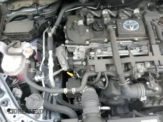 ✅ 2021 Toyota Corolla Hybrid LE • VIN: JTDEAMDE5MJ015206 • Лот: 84870535. Опубликован ранее на Copart с пробегом 67 752 миль. Бесплатный доступ к архиву аукционных продаж из США и подробный отчёт об истории автомобиля на DreamBid. Изображение 13.