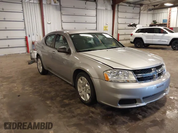 ✅ 2013 Dodge Avenger SE V6 • VIN: 1C3CDZAG1DN749582 • Lot: 42841424. Listed on IAAI with 132,040 mi. Free auction sales archive from the USA and detailed vehicle history report at DreamBid. Image 1.