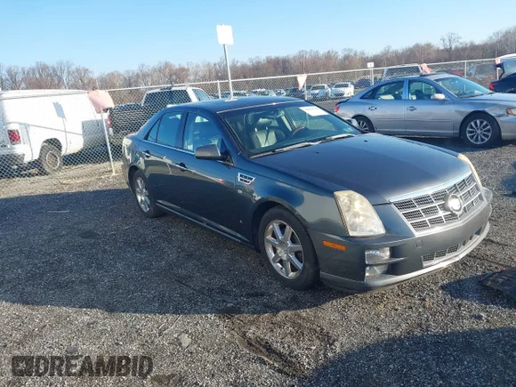 ✅ 2008 Cadillac STS RWD • VIN: 1G6DZ67A280203527 • Lot: 44010790. Listed on IAAI with 94,411 mi. Free auction sales archive from the USA and detailed vehicle history report at DreamBid. Image 1.