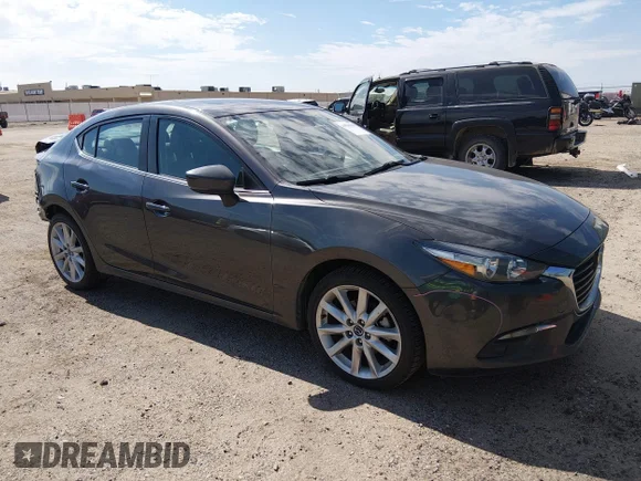 ✅ 2017 Mazda 3 Grand Touring • VIN: 3MZBN1W30HM127032 • Lot: 44550350. Listed on IAAI with 35,332 mi. Free auction sales archive from the USA and detailed vehicle history report at DreamBid. Image 1.