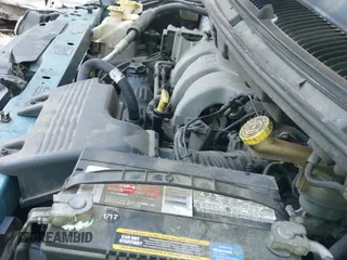 ✅ 1999 Plymouth Voyager • VIN: 2P4GP25GXXR159843 • Lot: 43213077. Listed on IAAI with 140,739 mi. Free auction sales archive from the USA and detailed vehicle history report at DreamBid. Image 12.