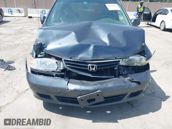 ✅ 2004 Honda Odyssey EX-L • VIN: 5FNRL18754B006907 • Лот: 45022885. Опубліковано раніше на IAAI з пробігом 195 896 миль. Безкоштовний доступ до архіву аукціонних продажів зі США та докладний звіт про історію автомобіля на DreamBid. Зображення 6.