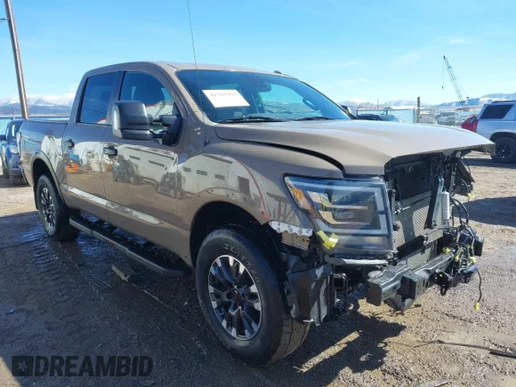 ✅ 2021 Nissan Titan Pro-4X • VIN: 1N6AA1ED9MN527737 • Lot: 41761997. Wystawiony na IAAI z przebiegiem 26 837 mil. Bezpłatny archiwum sprzedaży aukcyjnych z USA i szczegółowy raport historii pojazdu na DreamBid. Zdjęcie 1.