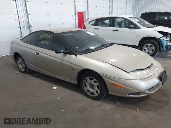 ✅ 2001 Saturn SC • VIN: 1G8ZP12841Z300417 • Lot: 42731965. Listed on IAAI with 151,041 mi. Free auction sales archive from the USA and detailed vehicle history report at DreamBid. Image 1.