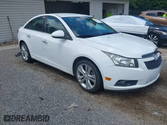 ✅ 2013 Chevrolet Cruze LTZ • VIN: 1G1PG5SB8D7119040 • Лот: 45381119. Опубликован ранее на IAAI с пробегом 140 958 миль. Бесплатный доступ к архиву аукционных продаж из США и подробный отчёт об истории автомобиля на DreamBid. Изображение 1.