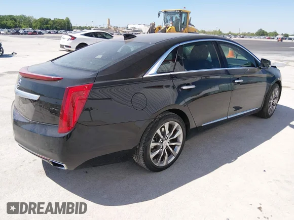 ✅ 2015 Cadillac XTS Premium • VIN: 2G61P5S34F9260231 • Lot: 44933921. Wystawiony na IAAI z przebiegiem 131 357 mil. Bezpłatny archiwum sprzedaży aukcyjnych z USA i szczegółowy raport historii pojazdu na DreamBid. Zdjęcie 4.