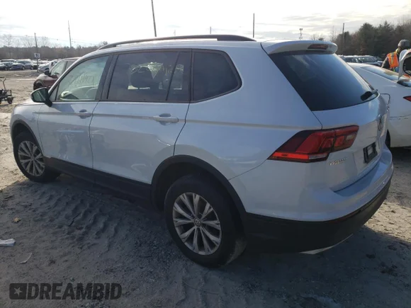 ✅ 2019 Volkswagen Tiguan S • VIN: 3VV0B7AX1KM070512 • Lot: 72066192. Listed on Copart with 73,228 mi. Free auction sales archive from the USA and detailed vehicle history report at DreamBid. Image 2.
