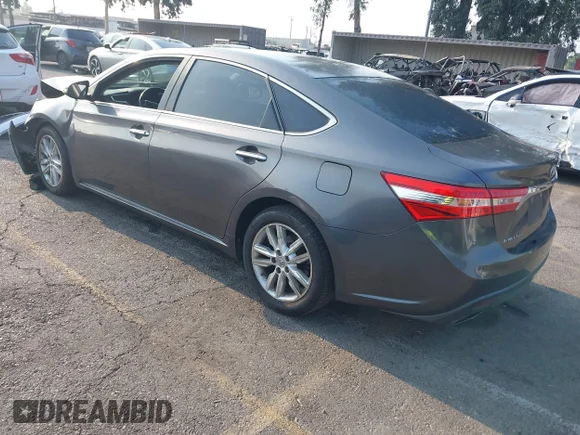 ✅ 2014 Toyota Avalon Limited • VIN: 4T1BK1EB5EU085626 • Lot: 42973550. Wystawiony na IAAI z przebiegiem 183 451 mil. Bezpłatny archiwum sprzedaży aukcyjnych z USA i szczegółowy raport historii pojazdu na DreamBid. Zdjęcie 3.