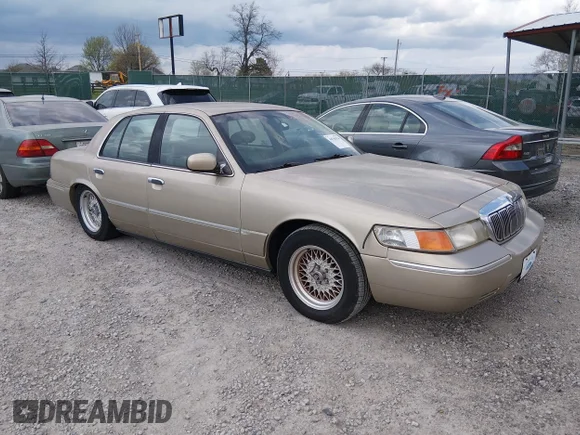 ✅ 2000 Mercury Grand Marquis LS • VIN: 2MEFM75W2YX624267 • Lot: 44750354. Listed on IAAI with 156,143 mi. Free auction sales archive from the USA and detailed vehicle history report at DreamBid. Image 1.