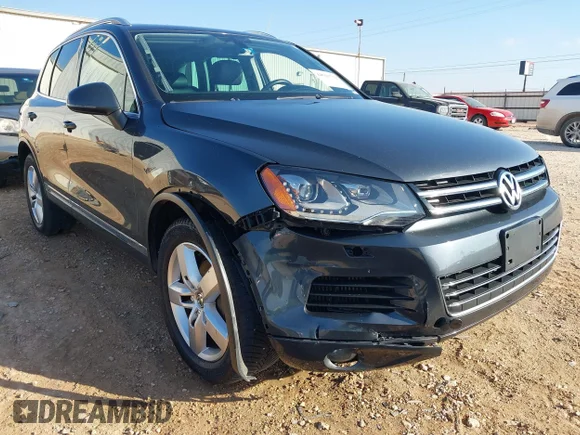✅ 2013 Volkswagen Touareg Sport • VIN: WVGEP9BP8DD013928 • Lot: 44511732. Wystawiony na IAAI z przebiegiem 174 053 mil. Bezpłatny archiwum sprzedaży aukcyjnych z USA i szczegółowy raport historii pojazdu na DreamBid. Zdjęcie 6.