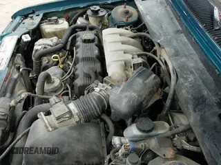 ✅ 1994 Ford Tempo • VIN: 1FAPP31X6RK108511 • Lot: 42004445. Listed on IAAI with 3,310 mi. Free auction sales archive from the USA and detailed vehicle history report at DreamBid. Image 12.