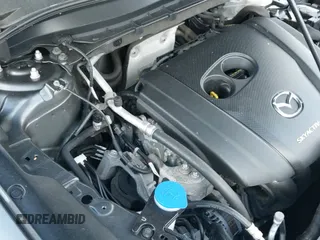 ✅ 2020 Mazda CX-5 Touring • VIN: JM3KFBCM7L0818516 • Lot: 43651797. Listed on IAAI with 55,429 mi. Free auction sales archive from the USA and detailed vehicle history report at DreamBid. Image 20.