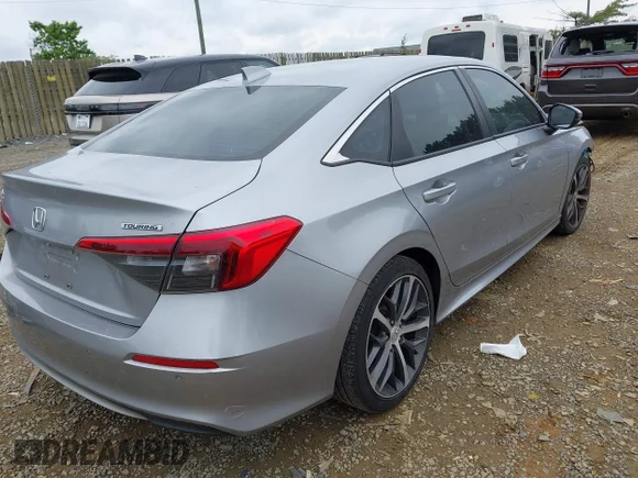 ✅ 2022 Honda Civic Touring • VIN: 2HGFE1F99NH305248 • Lot: 45024146. Wystawiony na IAAI z przebiegiem 135 326 mil. Bezpłatny archiwum sprzedaży aukcyjnych z USA i szczegółowy raport historii pojazdu na DreamBid. Zdjęcie 4.