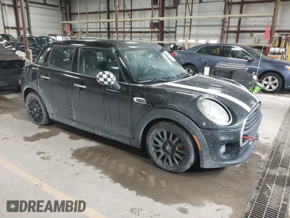 ✅ 2018 MINI Hardtop 4 Door Cooper • VIN: WMWXU1C58J2F79728 • Lot: 44628143. Wystawiony na IAAI z przebiegiem 67 979 mil. Bezpłatny archiwum sprzedaży aukcyjnych z USA i szczegółowy raport historii pojazdu na DreamBid. Zdjęcie 1.