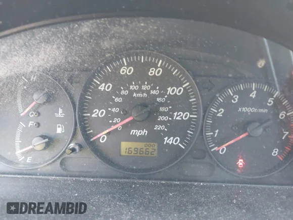 ✅ 2002 Mazda Protege DX • VIN: JM1BJ225121601070 • Lot: 41650083. Wystawiony na IAAI z przebiegiem 169 662 mil. Bezpłatny archiwum sprzedaży aukcyjnych z USA i szczegółowy raport historii pojazdu na DreamBid. Zdjęcie 7.