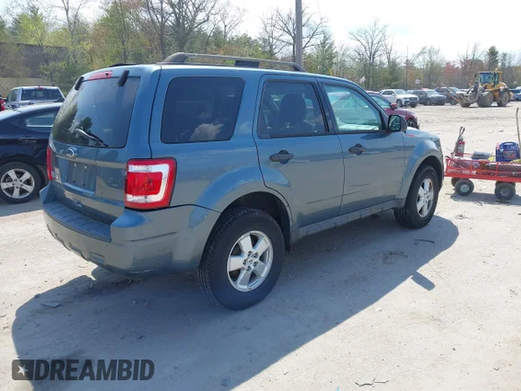 ✅ 2010 Ford Escape XLT • VIN: 1FMCU9D77AKC68753 • Lot: 45045687. Listed on IAAI with 217,569 mi. Free auction sales archive from the USA and detailed vehicle history report at DreamBid. Image 4.