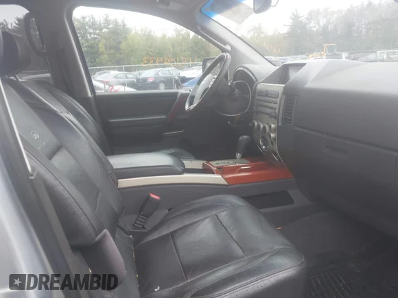 ✅ 2007 Infiniti QX56 • VIN: 5N3AA08C57N805539 • Лот: 45102933. Опубліковано раніше на IAAI з пробігом 197 494 миль. Безкоштовний доступ до архіву аукціонних продажів зі США та докладний звіт про історію автомобіля на DreamBid. Зображення 5.