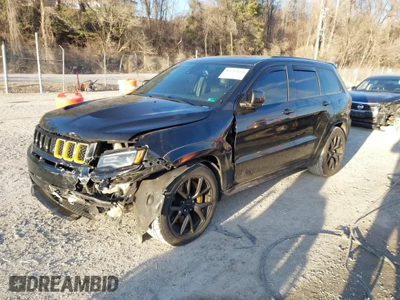 ✅ 2015 Jeep Grand Cherokee SRT • VIN: 1C4RJFDJ9FC877961 • Lot: 44215634. Listed on IAAI with 110,068 mi. Free auction sales archive from the USA and detailed vehicle history report at DreamBid. Image 2.