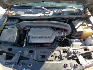 2006 Saturn VUE z VIN 5GZCZ53406S884550, wystawiony jako Copart lot #83521904 z przebiegiem 216 930 mil mil oraz Szkoda całkowita • Salvage title. Historia ofert i sprzedaży dostępna na DreamBid. Obrazek 14.