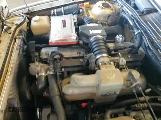 ✅ 1988 BMW 6 Series • VIN: WBAEC8415J3266786 • Lot: 83699944. Wystawiony na Copart z przebiegiem 178 899 mil. Bezpłatny archiwum sprzedaży aukcyjnych z USA i szczegółowy raport historii pojazdu na DreamBid. Zdjęcie 13.