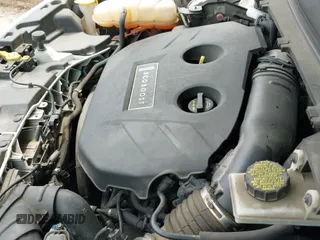 ✅ 2015 Lincoln MKC • VIN: 5LMTJ2AH1FUJ32057 • Lot: 42495924. Listed on IAAI with 82,125 mi. Free auction sales archive from the USA and detailed vehicle history report at DreamBid. Image 19.